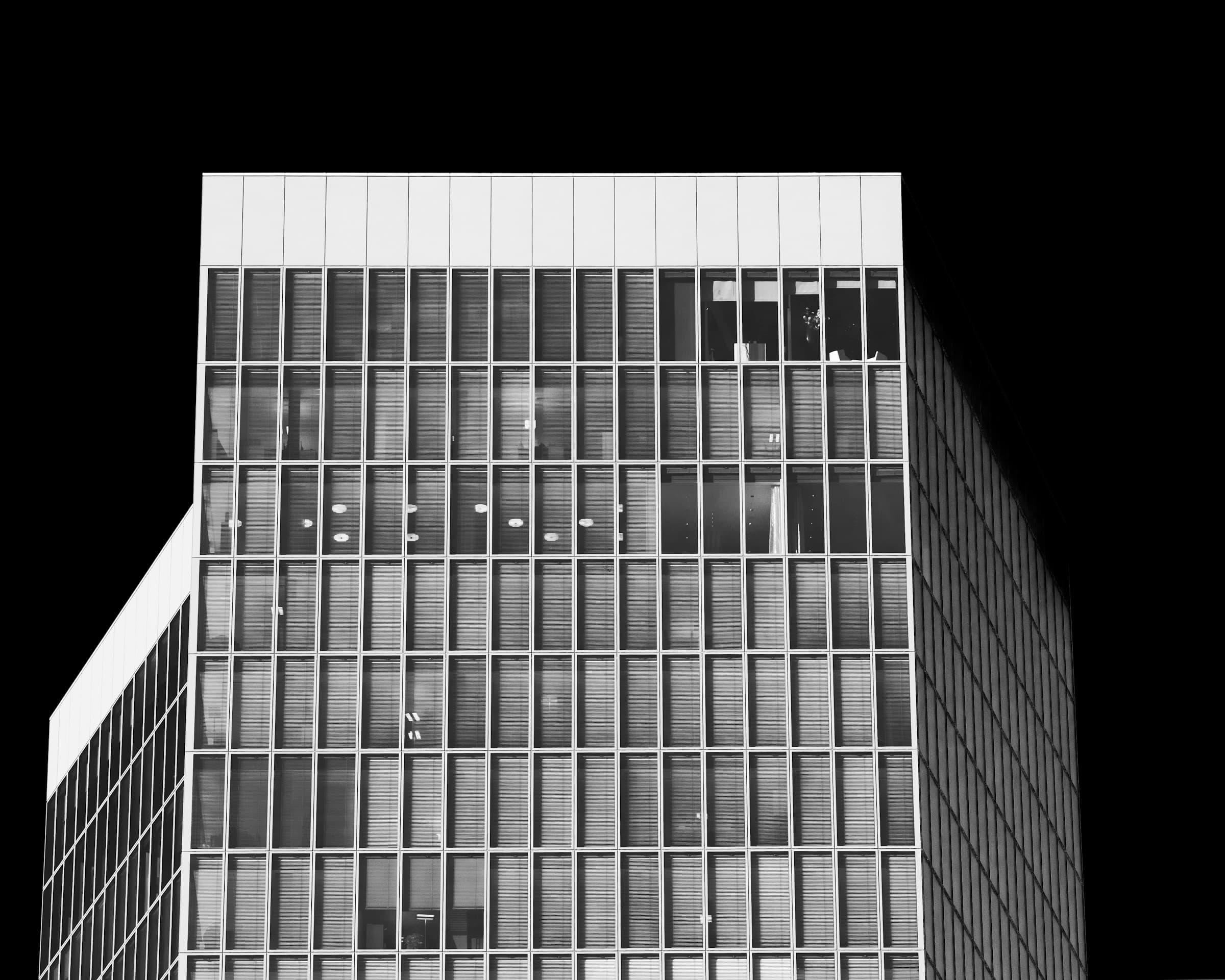 Minimalist modern architectural building facade with geometric grid